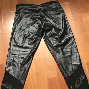 Leather black pants. With mesh at the bottom